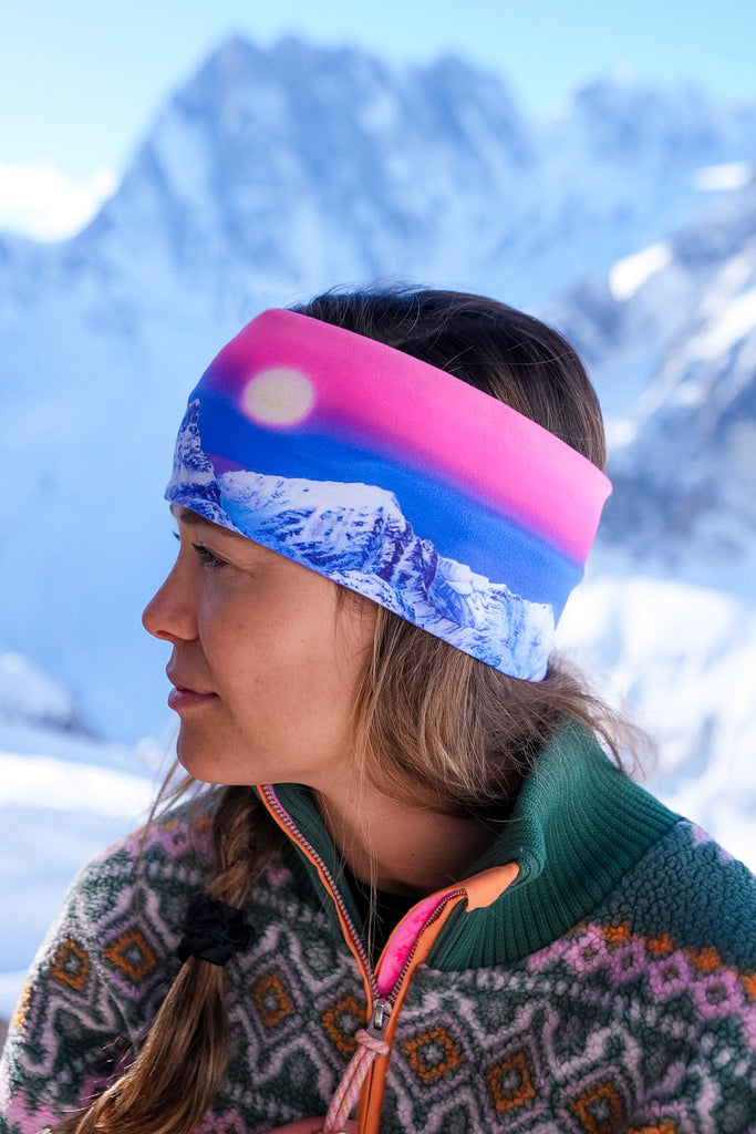 Side profile of woman wearing the Arctic Moonrise headband with a snowy background