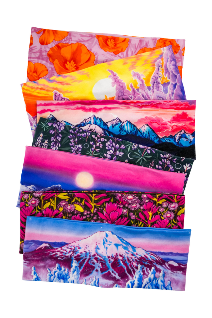 Seven headbands stacked on top of each other on a white background