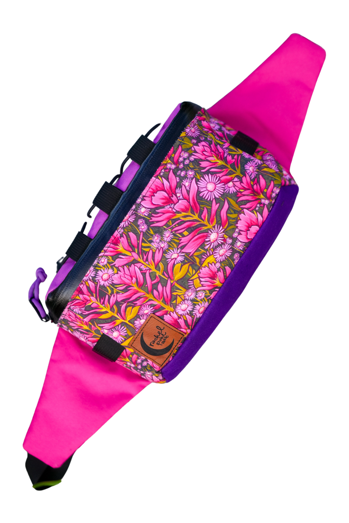 Paintbrush and asters hip pack on blank background